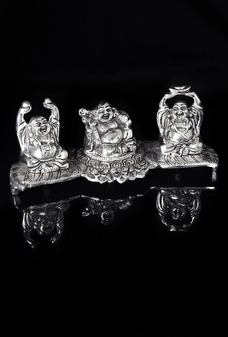 Three Laughing Buddha Figurines