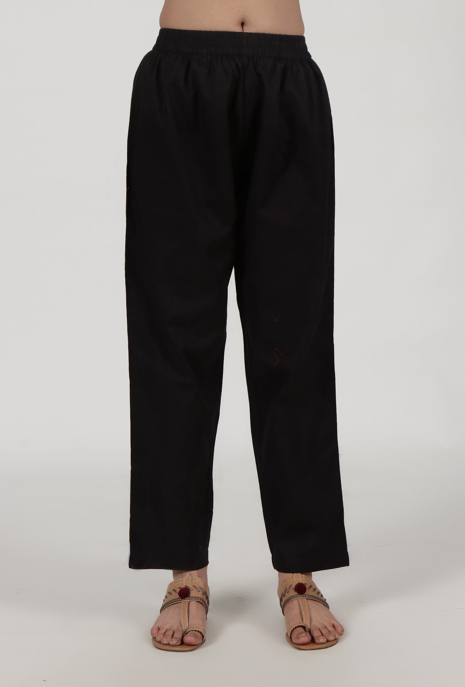 black cotton pants with a slim fit design