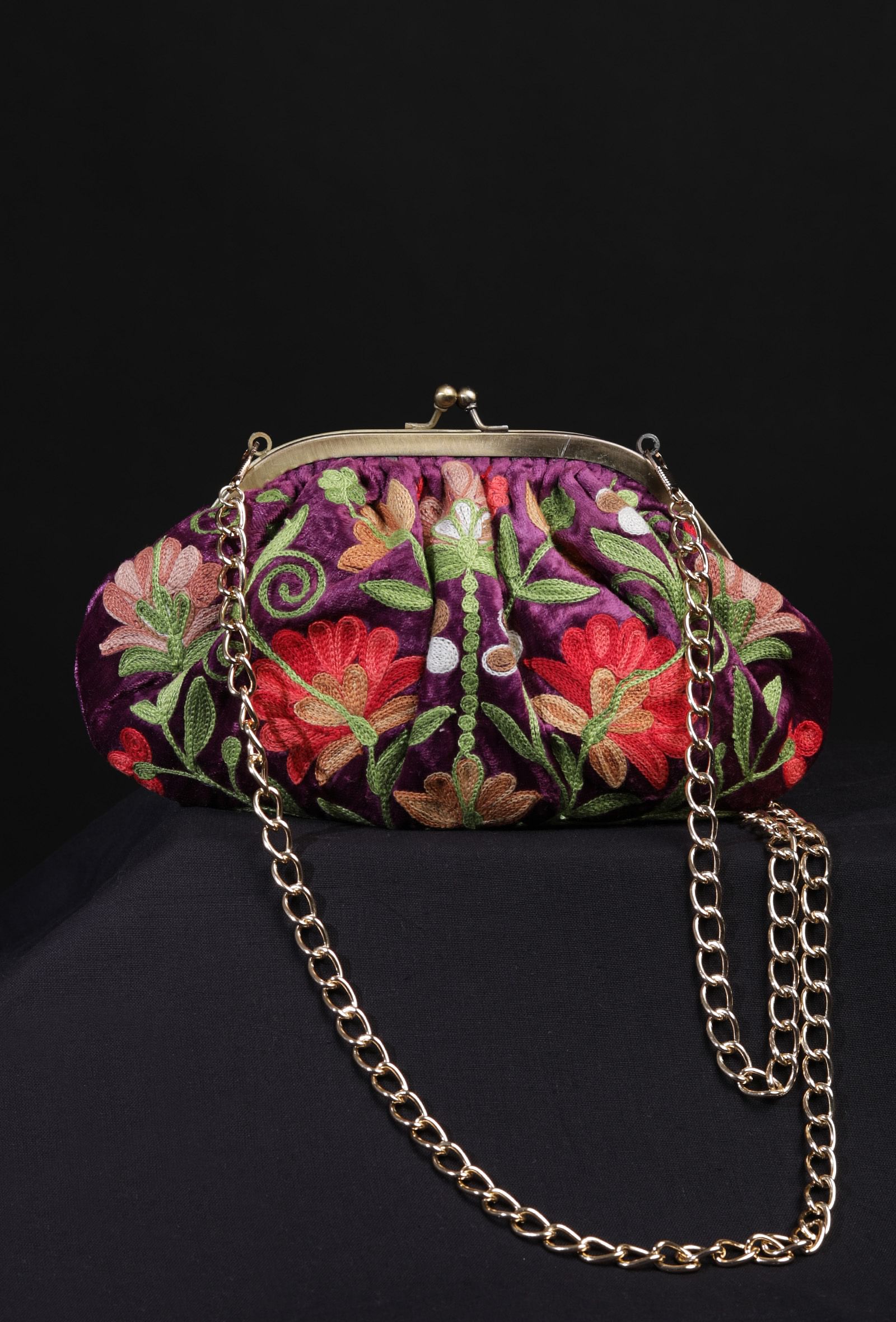 Purple gathered clutch