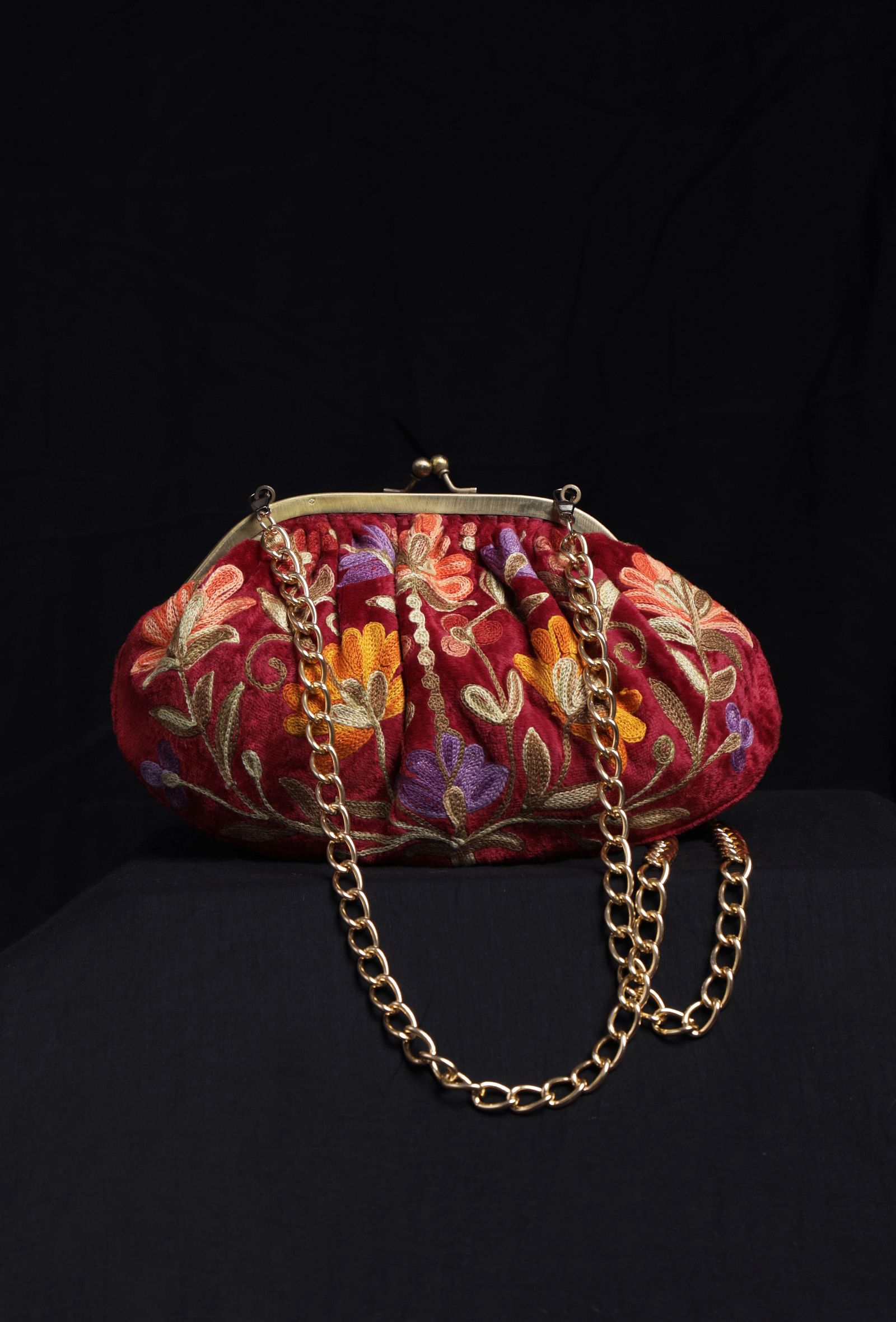Red gathered clutch