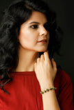 Dhokra-Inspired Green Thread German Silver Bracelet