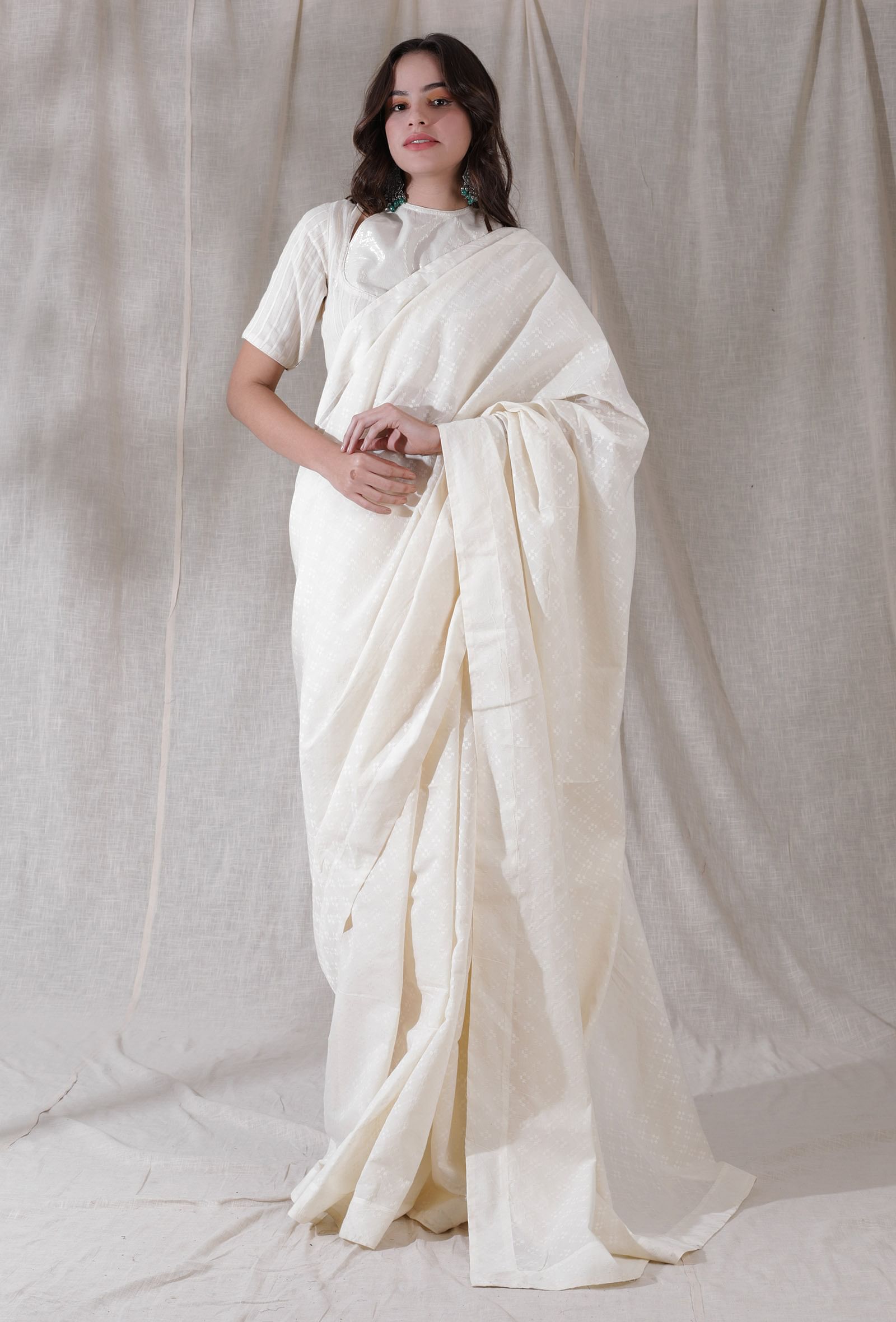 Off white self work detailed heavy cotton saree