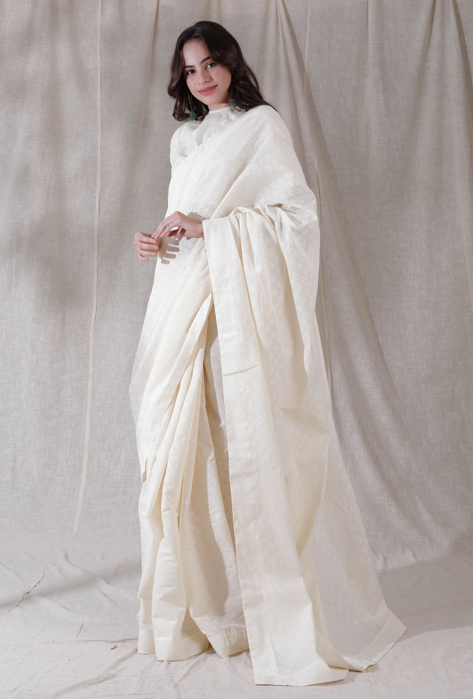 Off white self work detailed heavy cotton saree