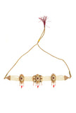 Ivory Meenakari pearl choker necklace with geometric kundan center and red bead drops on white background