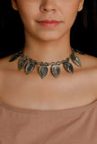 Golden and black handcrafted German silver Vidhya necklace with elegant antique detailing by Saagah by Tjori
