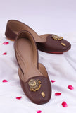 Classic tan brown jutti with chandbali and ghungroo — part of the Tjori ready-to-ship look