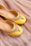 Yellow And Pink Embroidered Silk Juttis