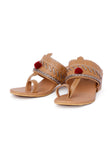 Elegant tan and silver vegan leather heels with pom pom accents