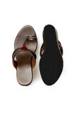 Handcrafted Kolhapuri-inspired rose gold wedge sandals