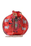 Shreenath’s Radiant Orange Potli With White Moti