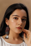 Raami contrast thread handcrafted tribal earrings by Saagah by Tjori