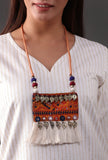 Orange Kutch tasselled pendant necklace by Saagah by Tjori