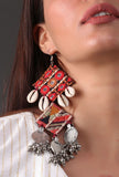 Rahi Kutch gold-tone brass dancing bell drop earrings with red glass beads by Saagah by Tjori