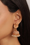 Laxmi Devi And Peacock Combination In Matte Finish With Pair Jhumkas And Beads Hanging