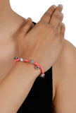 Peach German Silver Threaded Bracelet