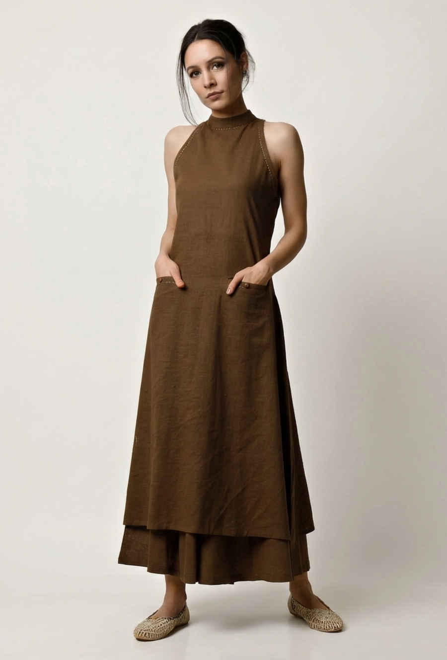 Woman wearing a mehendi green halter neck cotton slub kurta by Tjori