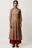 Front view of Kalidar Kalamkari cotton kurta with red, blue and mustard block print, worn over red pants