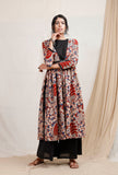 Kalamkari hand-block printed red cape overlay with vintage coins on a female model