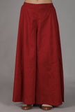 Maroon cotton slub flared pants formal on a female model
