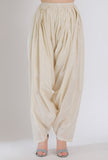 Off white lurex cotton draped dhoti pants casual on a female model