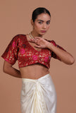 Red raw silk embroidered blouse vibrant festive on a female model