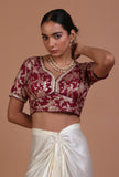 Maroon raw silk blouse with handcrafted embroidery for festive and bridal occasions by Tjori