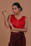 Red raw silk plain blouse for festive and bridal occasions by Tjori