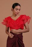 Red organza plain blouse festive on a female model