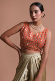 Orange raw silk blouse with intricate mirror work embellishment for festive and wedding wear by Tjori