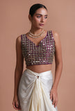 Light purple raw silk blouse with intricate mirror work embellishment for festive and wedding wear by Tjori