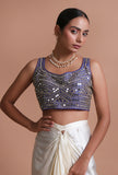 Blue raw silk mirror work blouse festive on a female model