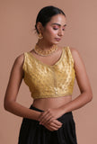 Golden raw silk embroidered blouse for festive and bridal occasions by Tjori