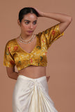 Mustard yellow raw silk blouse festive on a female model