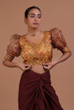 Yellow organza printed blouse for festive and bridal saree draping by Tjori