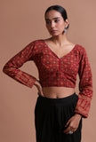 Maroon cotton ajrakh printed full sleeve blouse festive on a female model