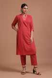 Red cotton plain kurta and pant set everyday casual on a female model