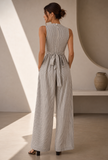 Black and white striped sleeveless jumpsuit by Tjori – back view