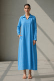 Woman wearing a sky blue relaxed-fit cotton collared maxi dress with full sleeves by Tjori