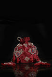 Crimson red potli bag – part of the festive gift set by Saagah by Tjori