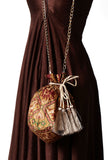 Falak golden and multi silk patola print potli bag with tassels by Saagah by Tjori – handcrafted ethnic clutch