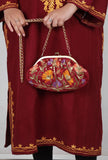 Red gathered clutch