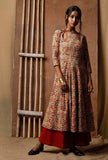 Model in kalidar Kalamkari cotton kurta showing front flare and keyhole neckline, paired with red bottoms