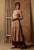 Three-quarter sleeve Kalamkari cotton kurta with flowing kalidar cut in red, blue and mustard, side profile