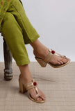 Stylish gold vegan leather heels with ankle strap