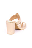 Golden heeled sandals with soft vegan leather finish