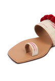 Tawny Brown Ikat One Toe Cruelty Free Leather Flats With Red Pom Pom